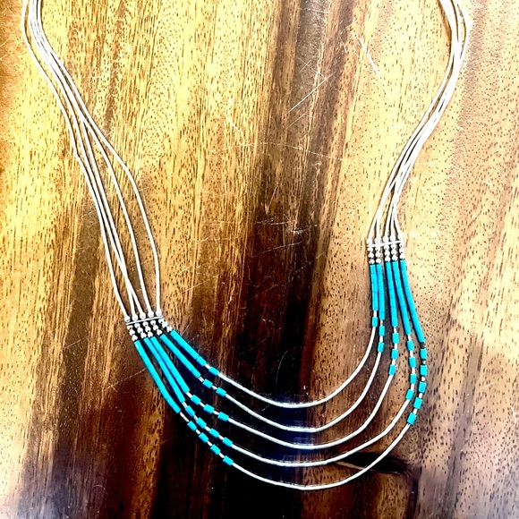 Vintage liquid silver with turquoise accents